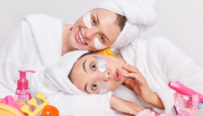 Two girls with skincare products