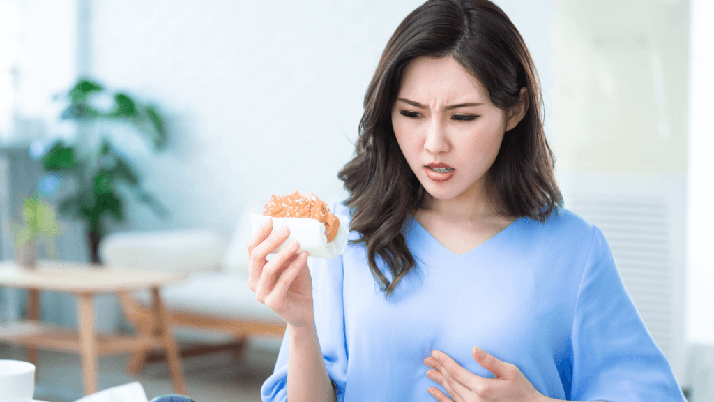 A girl having indigestion